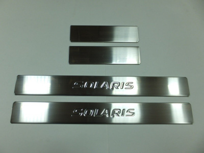 Hyundai Solaris (10–/14–) Накладки на пороги, нерж., 4 части (надпись SOLARIS)